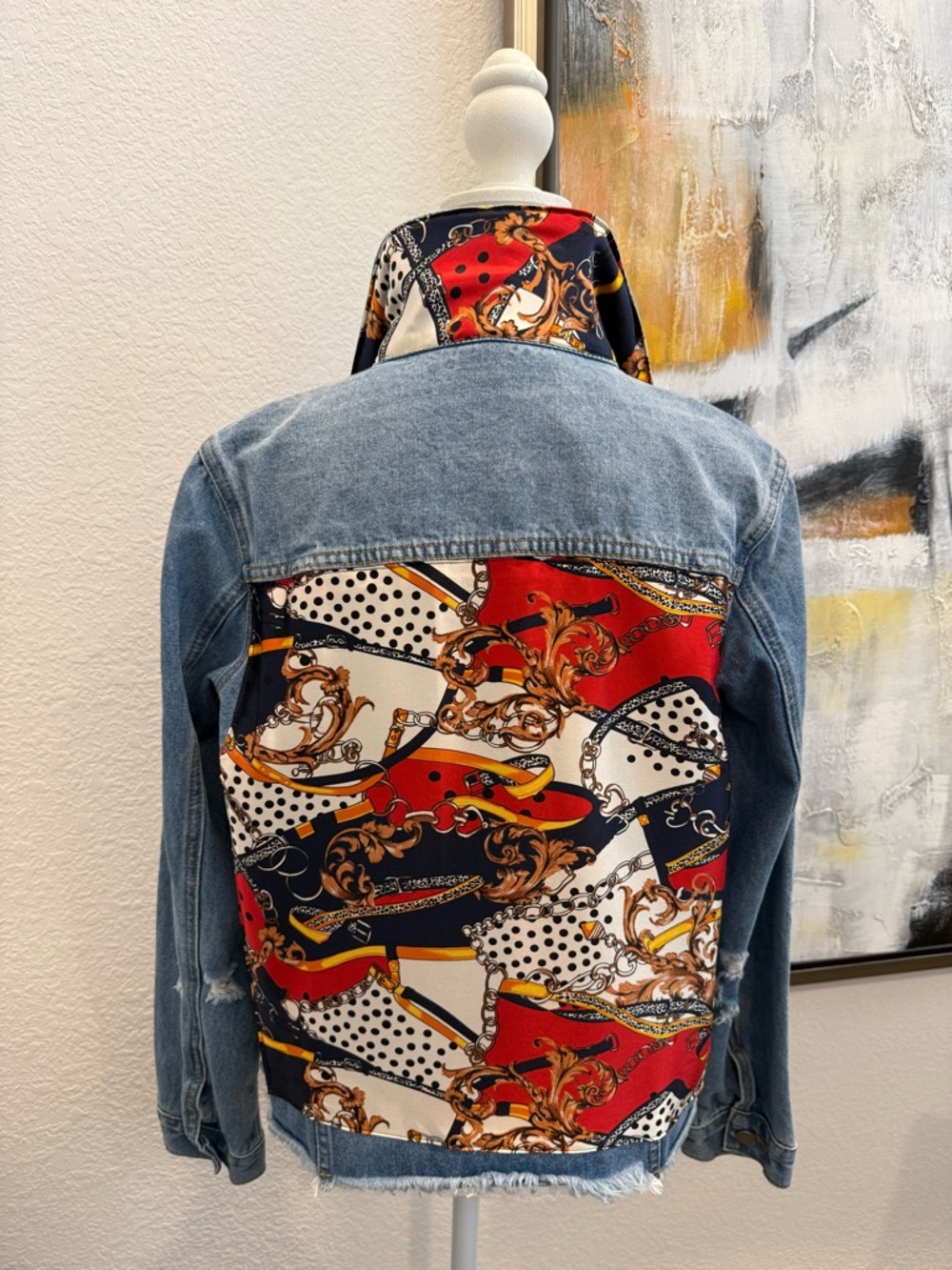 Denim jacket with designer scarf like silk printed fabric inlay. NWT, size XS.